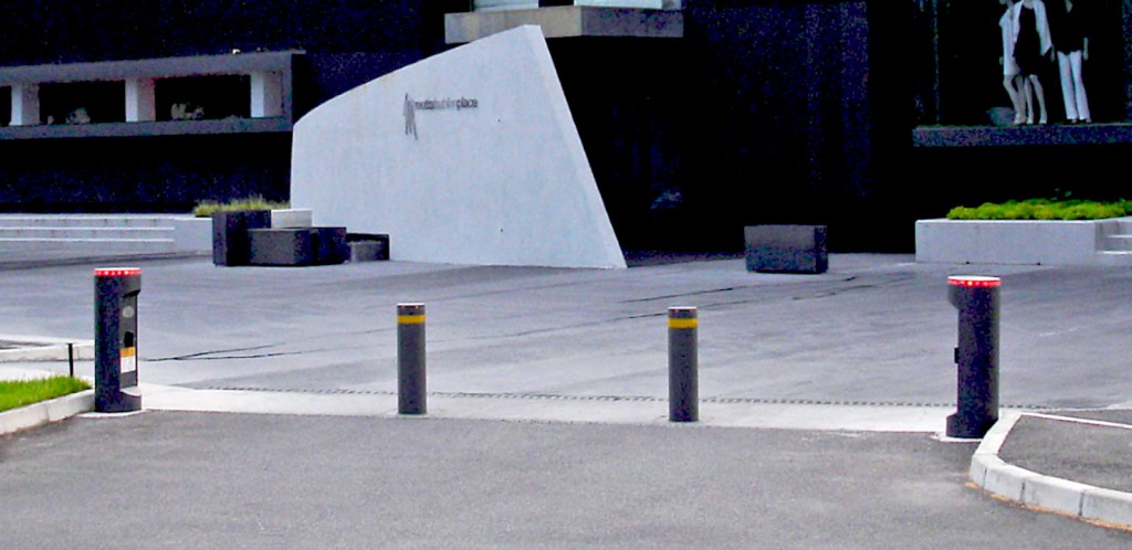 A typical installation of two AMP 1000 bollards operating together, with control gear contained within the single height Totem units with integral LED traffic lights.